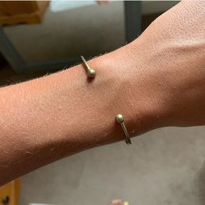 Gold bracelet w/ fun charms attached